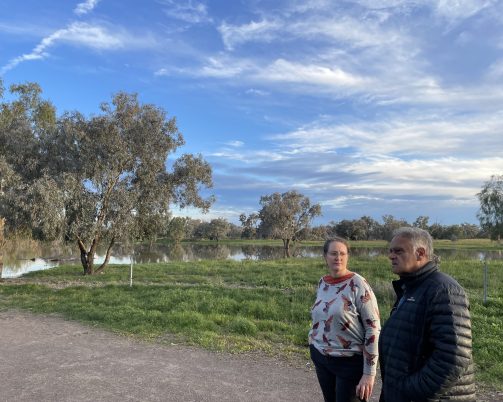 Jen Crawford and Paul Collis at the overflow of the Barka / Darling River, North Bourke, September 15, 2022 ©Paul Magee